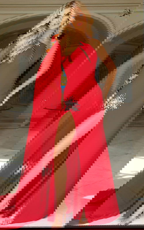 One shoulder gown with crystal embellishments and cape sleeve