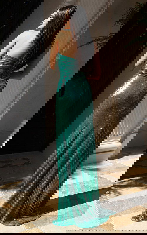 Metallic emerald gown with sweetheart neckline and ruched design