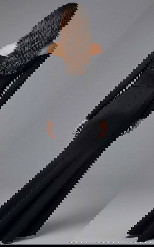 Back view of off shoulder formal gown with long sleeves and clean lines