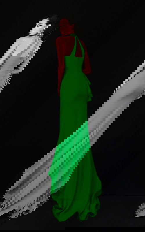 Green halter prom dress with beaded neckline and side ruffle detail